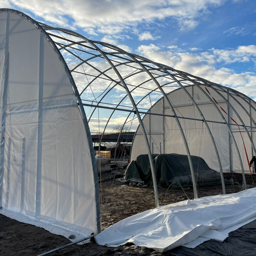 Dlaczego bezpośrednia współpraca z producentem hal namiotowych obniża koszty inwestycji?